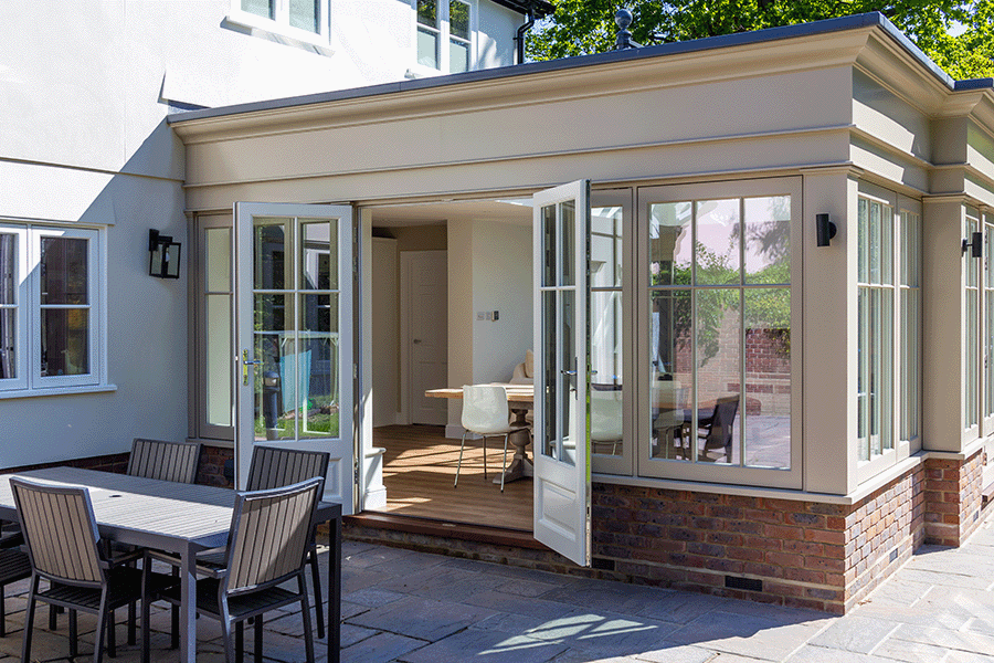 orangery extension with cream timber windows and doors