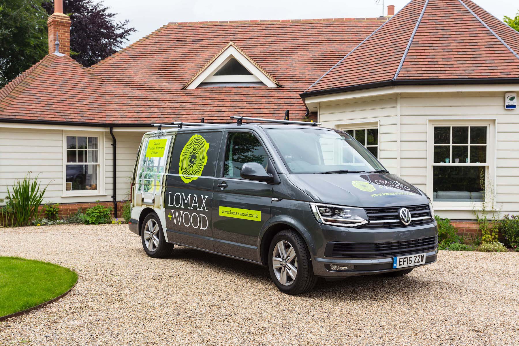 Lomax van outside bespoke home