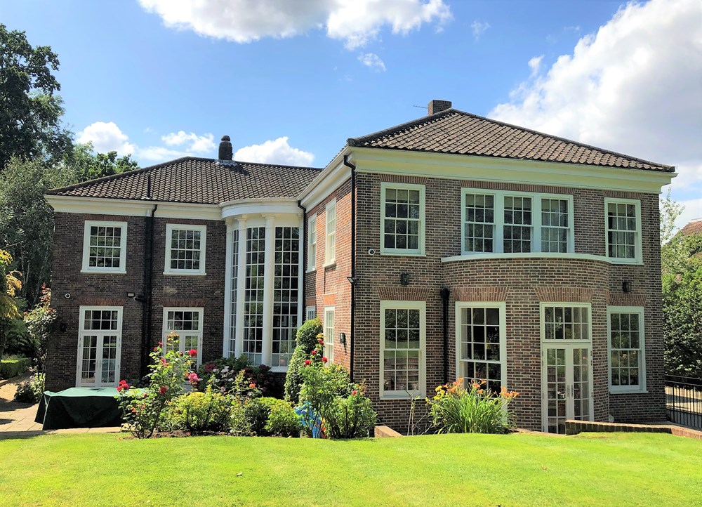 Curved bespoke single glazing window installation