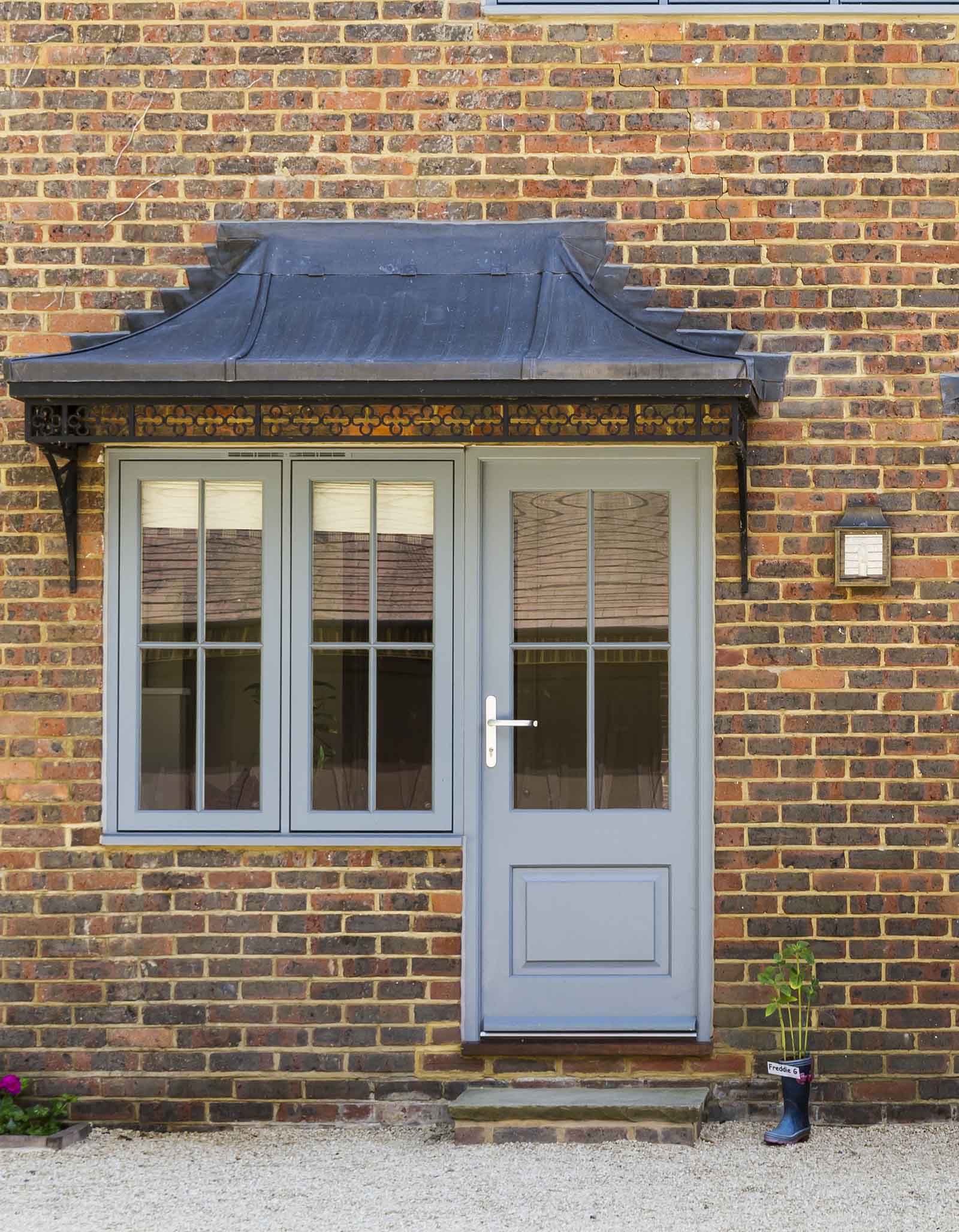 Single timber door with casement side window