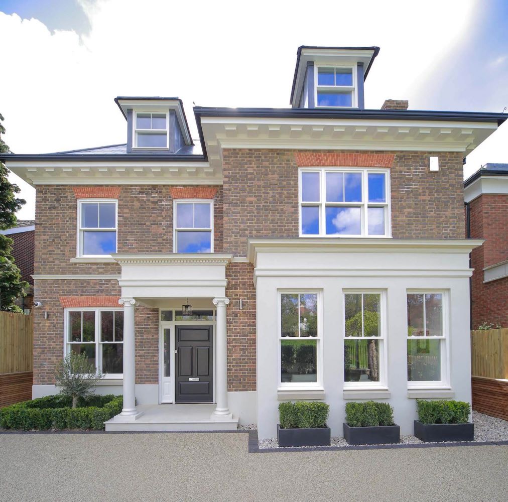 Wooden sash spring balance windows installed on London home