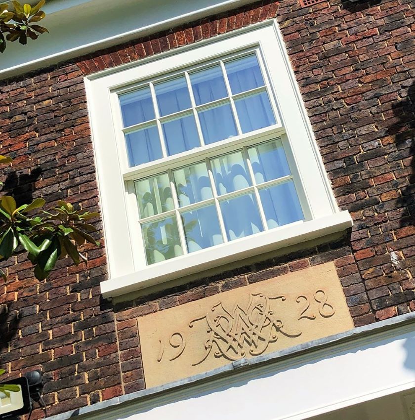 white timber box sash window installed in London on brick house